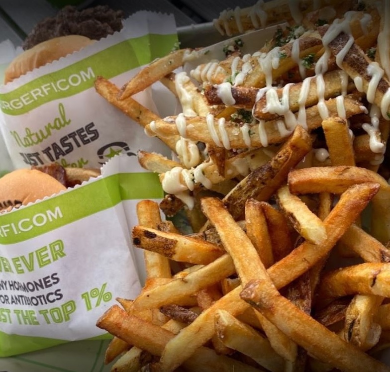 BurgerFi restaurant dining room and food